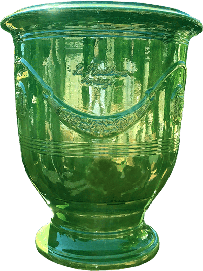 Green decorative vase with intricate design